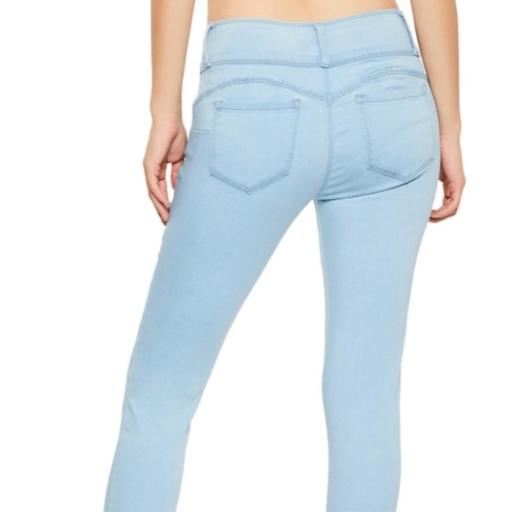 Light denim skinny jeans